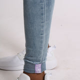 Light Wash Skinny Jeans With Signature Hem