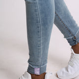 Light Wash Skinny Jeans With Signature Hem