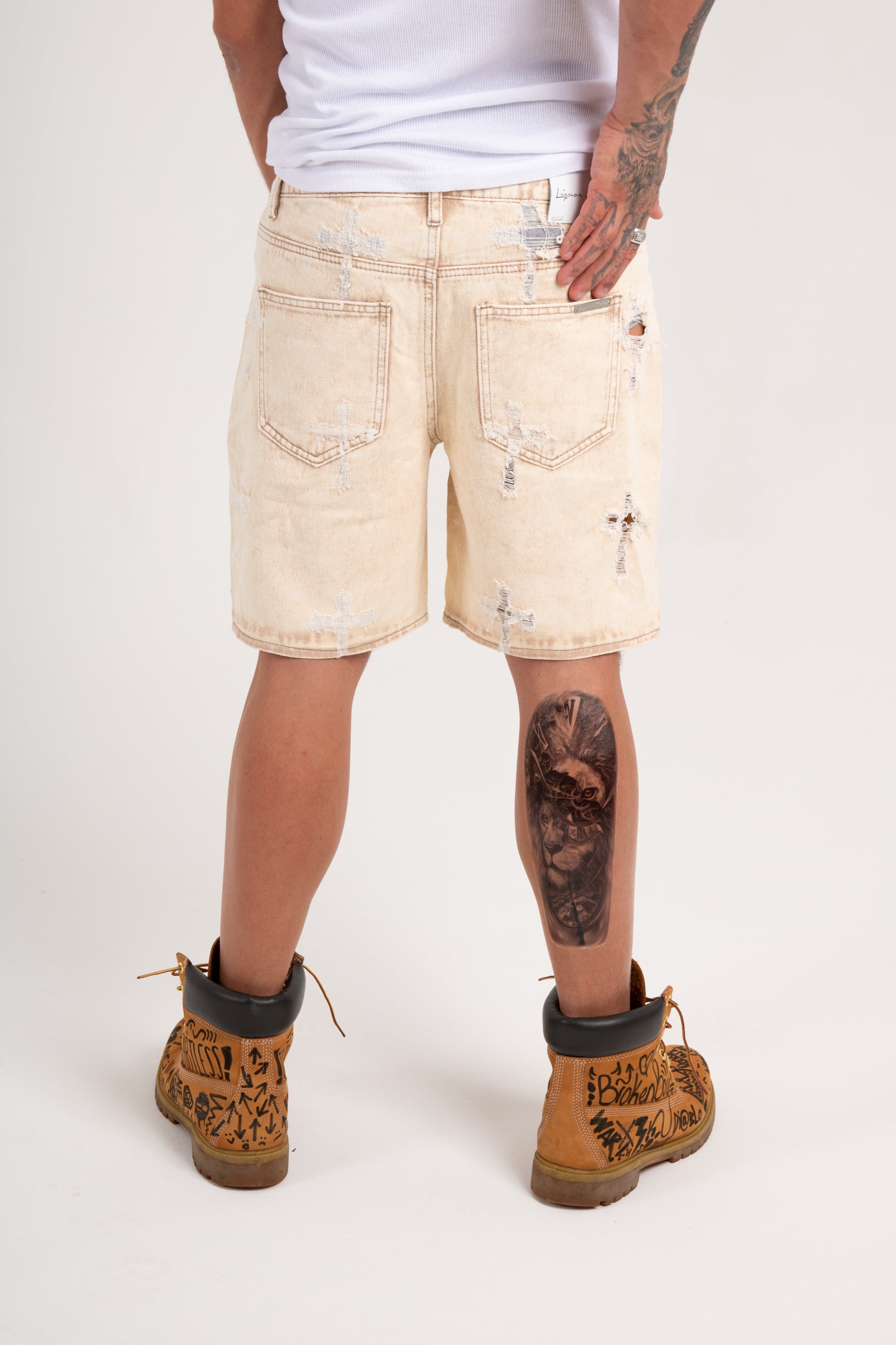 Distressed Cross Denim Shorts in Beige