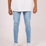 Logan Stonewash Paint Splatter Skinny Jeans