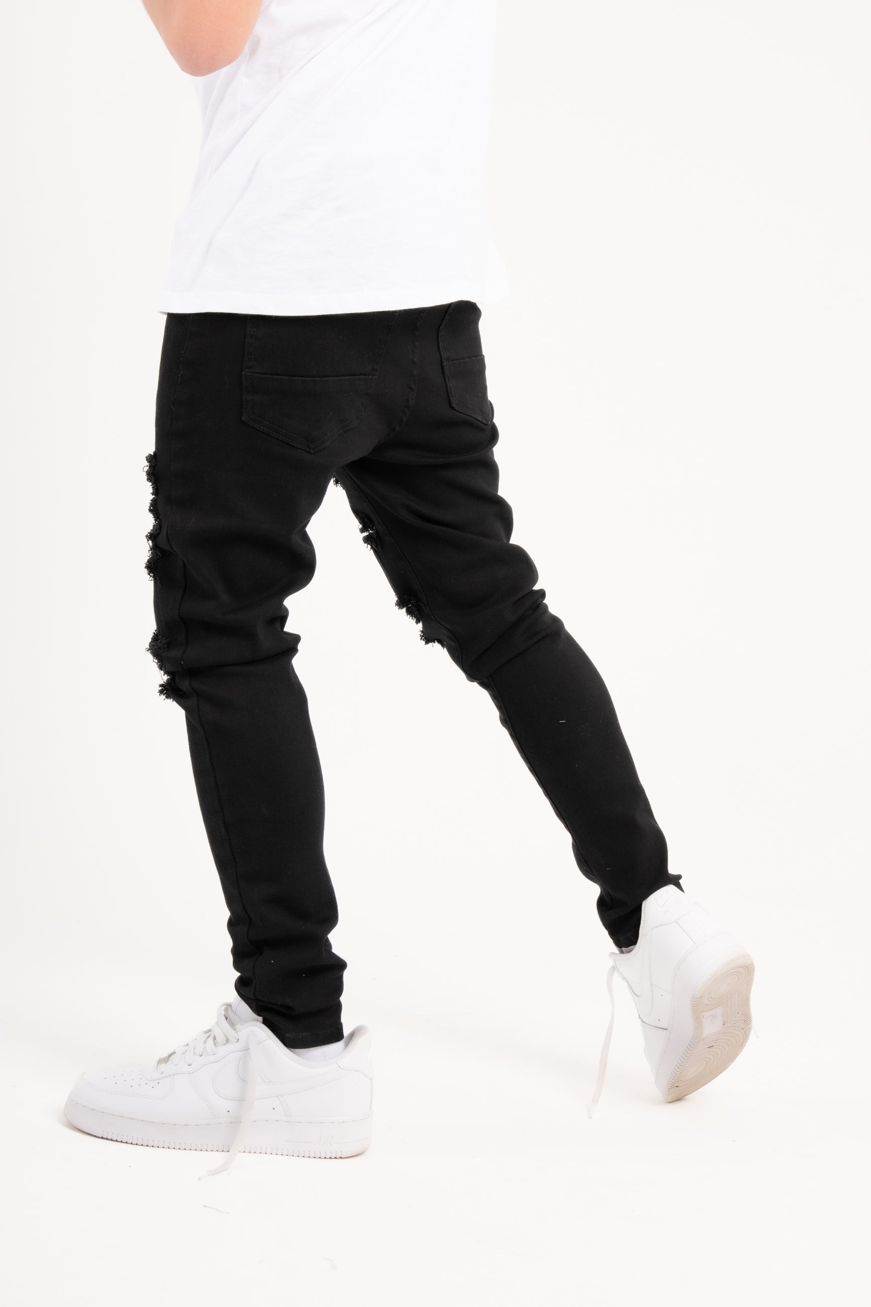 Logan Stretch Skinny Fit Jeans With Rips In Black