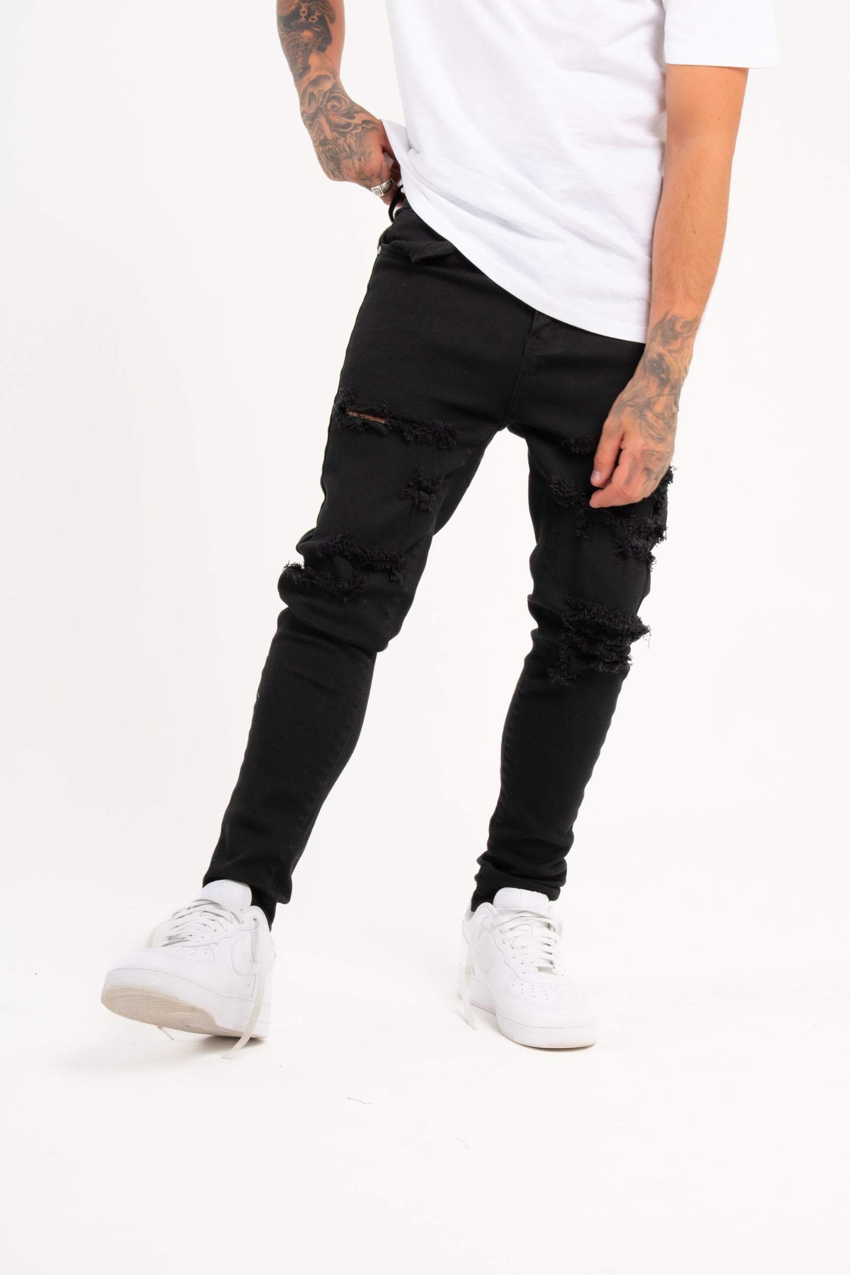 Logan Stretch Skinny Fit Jeans With Rips In Black