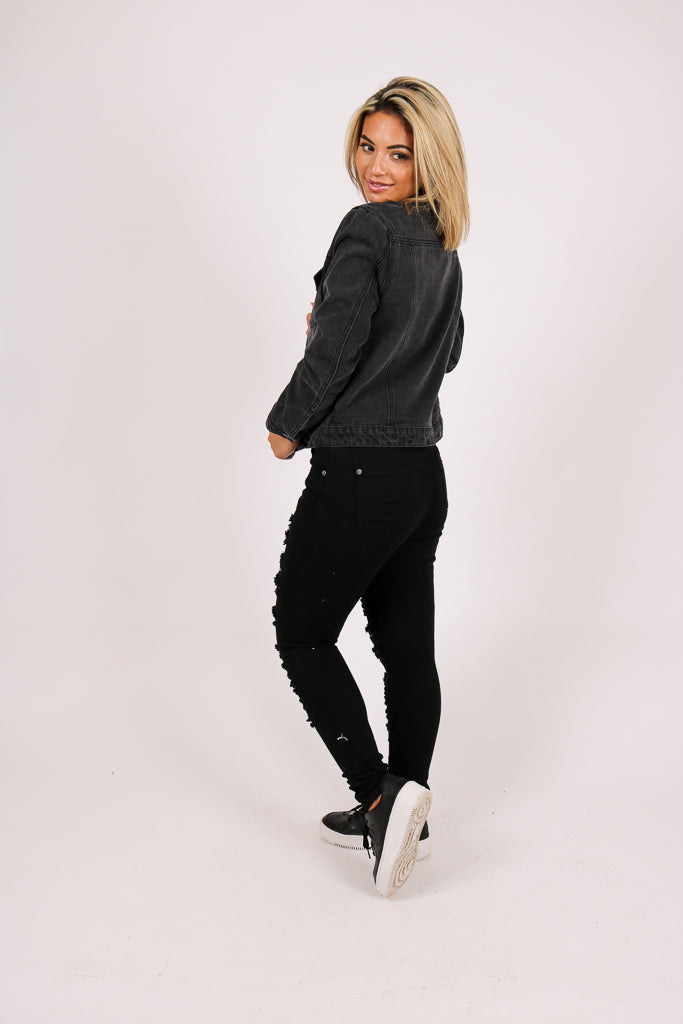 Mid-Rise Black Super Distressed Skinny